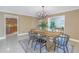 Spacious dining area with wooden table and kitchen view at 2267 Heron Cir, Clearwater, FL 33762