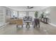 Living room with tile floors, seating area, and ceiling fan at 2267 Heron Cir, Clearwater, FL 33762