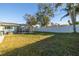 Expansive backyard with grassy area and pool at 2308 Victory Ave, Largo, FL 33770