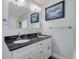 Bathroom featuring double vanity and granite countertop at 2308 Victory Ave, Largo, FL 33770