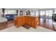 Kitchen island with granite countertop and wood cabinets at 2308 Victory Ave, Largo, FL 33770