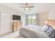 Spacious bedroom with a dresser and large bed, offering ample space and natural light at 2441 Foggy Creek Cir, Clearwater, FL 33764