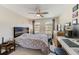 Bedroom with a desk, creating a functional workspace with a bed at 2441 Foggy Creek Cir, Clearwater, FL 33764