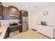 Modern kitchen with stainless steel appliances and an island at 2441 Foggy Creek Cir, Clearwater, FL 33764