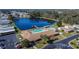 Community pool, parking, and lake view at 3022 Short Leaf St, Wesley Chapel, FL 33543