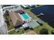 Community pool, shuffleboard, and clubhouse at 3022 Short Leaf St, Wesley Chapel, FL 33543