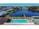 Community pool and hot tub with lake view at 3022 Short Leaf St, Wesley Chapel, FL 33543