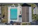 Communal pool with lounge chairs and building at 3022 Short Leaf St, Wesley Chapel, FL 33543