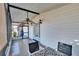 Screened porch features a ceiling fan and outdoor table at 3022 Short Leaf St, Wesley Chapel, FL 33543