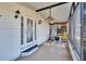 Cozy screened porch with ceiling fan and seating area at 3022 Short Leaf St, Wesley Chapel, FL 33543