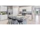 Kitchen with island, granite countertops and stainless steel appliances at 32722 Osprey Peak Way, San Antonio, FL 33576