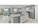 Modern kitchen with stainless steel appliances and granite countertops at 32722 Osprey Peak Way, San Antonio, FL 33576