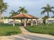 Relaxing community gazebo with picnic tables and landscaping at 3401 96Th N Ter # 4, Pinellas Park, FL 33782