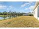 Spacious backyard with a pond view and privacy fence at 3409 77Th E Ct, Palmetto, FL 34221