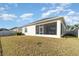 Large backyard with pond views and plenty of grass at 3409 77Th E Ct, Palmetto, FL 34221