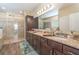 Elegant bathroom with double vanity, large shower, and soaking tub at 3409 77Th E Ct, Palmetto, FL 34221