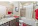 Clean bathroom with a tub shower combo and granite countertop at 3409 77Th E Ct, Palmetto, FL 34221