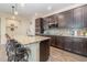 Modern kitchen with granite countertops and stainless steel appliances at 3409 77Th E Ct, Palmetto, FL 34221