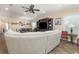 Spacious living room featuring a large sectional sofa and wood floors at 3409 77Th E Ct, Palmetto, FL 34221