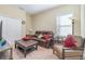 Relaxing living room with comfortable seating and a neutral color scheme at 3409 77Th E Ct, Palmetto, FL 34221
