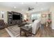 Spacious living room with hardwood floors and a large sectional sofa at 3409 77Th E Ct, Palmetto, FL 34221