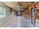 Spacious workshop with tools, shelving, and bicycle storage at 3478 Gum Dr, Weeki Wachee, FL 34607