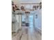 Hallway with loft access and fun decor at 3478 Gum Dr, Weeki Wachee, FL 34607