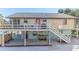 Elevated home with backyard patio and spacious deck at 3478 Gum Dr, Weeki Wachee, FL 34607