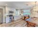 Bright kitchen with white cabinets, granite counters, and stainless steel appliances at 3478 Gum Dr, Weeki Wachee, FL 34607