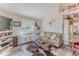 Living room features a comfy sofa and unique wooden coffee table at 3478 Gum Dr, Weeki Wachee, FL 34607