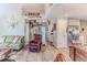 Relaxing living room with leather recliner and view into kitchen at 3478 Gum Dr, Weeki Wachee, FL 34607