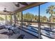 Spacious screened porch overlooking a lush landscape at 3478 Gum Dr, Weeki Wachee, FL 34607