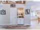 Stylish wet bar with granite countertop and glass shelving at 3478 Gum Dr, Weeki Wachee, FL 34607
