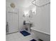 Bathroom with pedestal sink, clawfoot tub, and shower at 514 Wideview Ave, Tarpon Springs, FL 34689