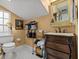 Bathroom with dark wood vanity and a glass shower at 514 Wideview Ave, Tarpon Springs, FL 34689
