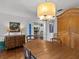 Bright dining room featuring a wood table and antique wooden hutch at 514 Wideview Ave, Tarpon Springs, FL 34689