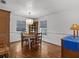 Classic dining room with hardwood floors and built-in corner cabinet at 514 Wideview Ave, Tarpon Springs, FL 34689