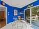 Kitchen features a breakfast nook with glass table and chairs at 514 Wideview Ave, Tarpon Springs, FL 34689
