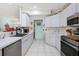 Well-equipped kitchen featuring ample counter space and storage at 5215 New Brittany Ln, Zephyrhills, FL 33541