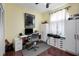 Home office with desk, chair, and ample storage at 5215 New Brittany Ln, Zephyrhills, FL 33541