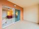 Balcony with sliding door access to bedroom at 5301 Gulf Blvd # E202, St Pete Beach, FL 33706
