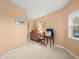 Bedroom with dresser and window at 5301 Gulf Blvd # E202, St Pete Beach, FL 33706