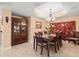 Formal dining room featuring a wood table and hutch at 5301 Gulf Blvd # E202, St Pete Beach, FL 33706