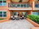 Relaxing patio with seating, overlooking water view at 5301 Gulf Blvd # E202, St Pete Beach, FL 33706