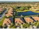 Aerial community view showing the neighborhood's layout and lake at 5608 Sunset Falls Dr, Apollo Beach, FL 33572