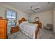 Cozy bedroom with antique wooden furniture at 5608 Sunset Falls Dr, Apollo Beach, FL 33572