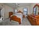 Charming bedroom with antique bed and dresser at 5608 Sunset Falls Dr, Apollo Beach, FL 33572