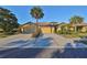 Attractive single-story home with two-car garage and lush landscaping at 5608 Sunset Falls Dr, Apollo Beach, FL 33572