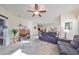 Spacious living room with comfortable seating and access to dining area at 5608 Sunset Falls Dr, Apollo Beach, FL 33572