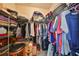 Large walk-in closet with ample shelving and hanging space at 5608 Sunset Falls Dr, Apollo Beach, FL 33572